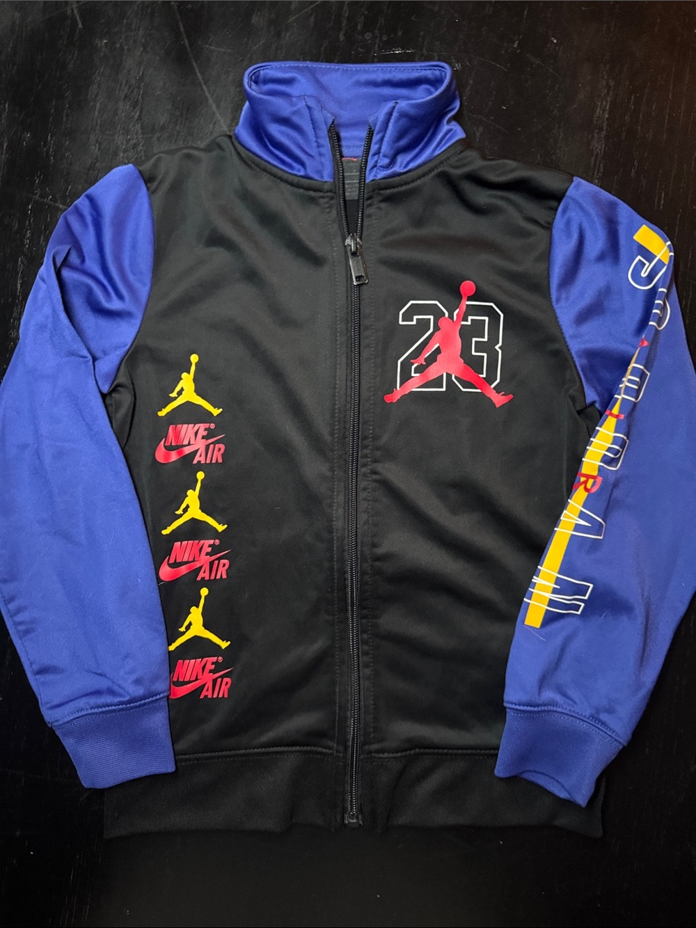 Jordan Black and Royal Blue Kids' Track Jacket with Red and Yellow Accents